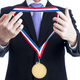 Illustration for article titled Russian Gold Medalists Get $120,000, a Brand New Mercedes
